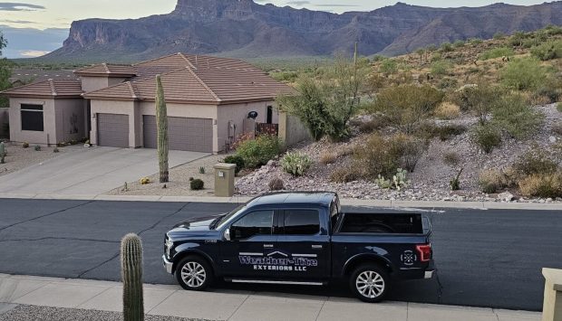 Weather-Tite Exteriors LLC truck parked in front of a home in Mesa, Arizona. Weather-Tite Exteriors LLC truck parked in front of a home in Mesa, Arizona.