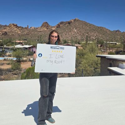 Happy Homeowner in Arizona with a new roof from weather-tite
